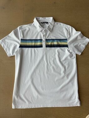 Travis Mathew White Polo with Blue and Yellow Chest Stripes for men